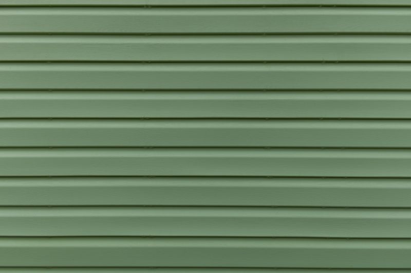 Seamless Vinyl Siding Application